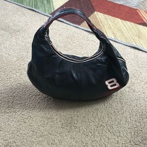 Wilson’s Leather Collab with NASCAR Dale Earnhardt Leather Purse